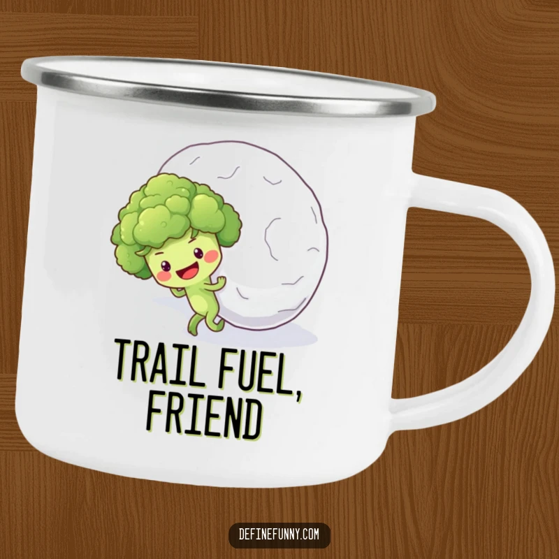 Funny camping mug showing a hopeful broccoli floret character pushing a giant snowball uphill, perfect for outdoor endeavors.