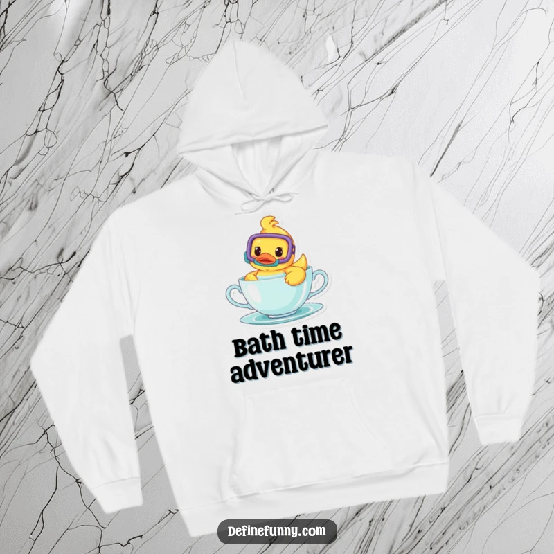 Funny hoodie featuring a happy rubber ducky wearing a snorkel, swimming playfully within a teacup, offering cozy humor.