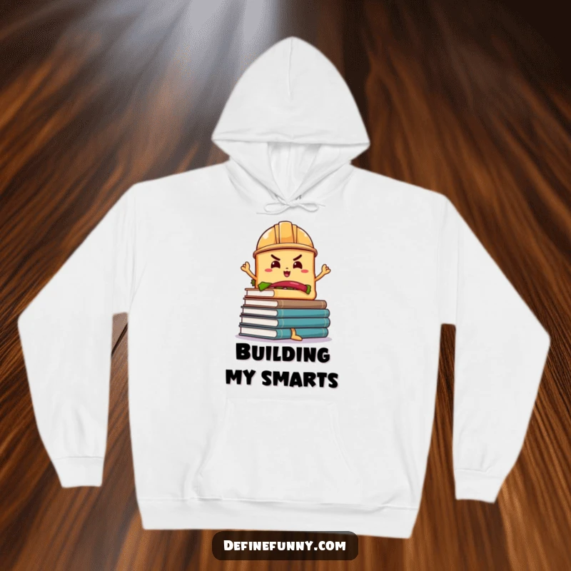 Funny Sandwich Book Balance Hoodie: A determined sandwich in a hard hat balances wobbly books, a cozy and funny pullover.