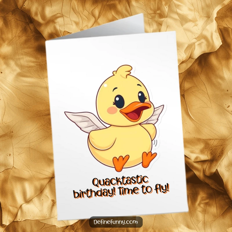 Funny Free Printable Birthday Card: A rubber duck with paper wings tries to fly, looking determined and silly.