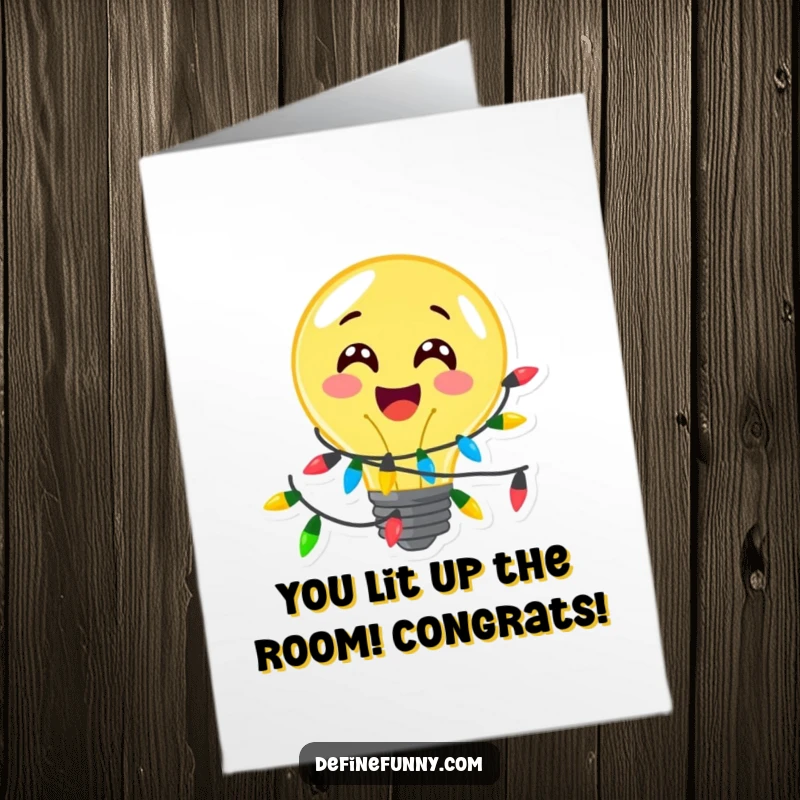 Funny Free Printable Congratulations Card: A lightbulb character wrapped in festive lights beams with delight.