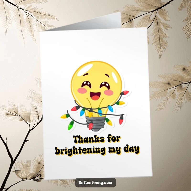Funny Free Printable Thank You Card: A lightbulb character wrapped in festive lights expresses bright gratitude.