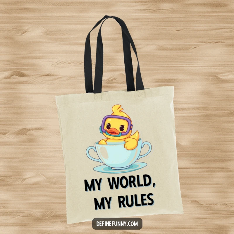 Funny tote bag with a cheerful rubber ducky wearing a snorkel, swimming inside a teacup, perfect for carrying belongings with humor.
