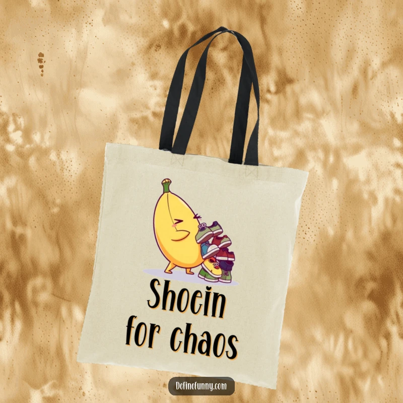 Funny tote bag with a winking banana character balancing a teetering stack of tiny, mismatched shoes. Practical and amusing.